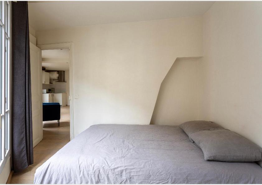 Appartement Le Bon Marche Paris Bagian luar foto