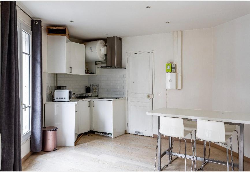Appartement Le Bon Marche Paris Bagian luar foto